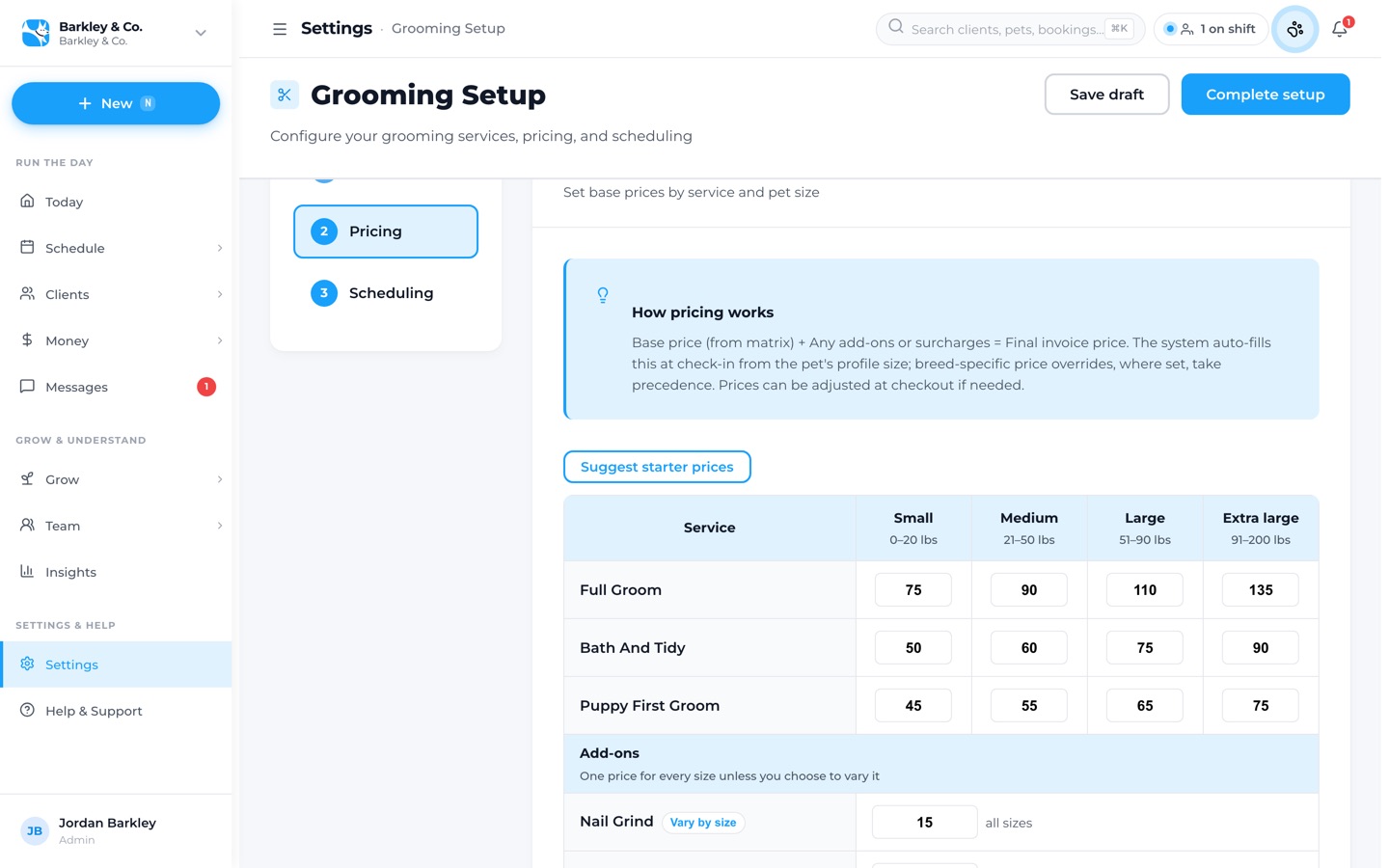 Woof's grooming setup: a price table with services down the side and small, medium, large and extra large sizes across the top, with add-ons below
